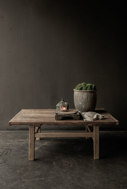 Tough rural coffee table made in India from old used fruit tree wood