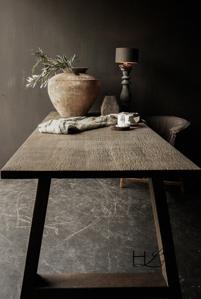 Beautiful, sturdy, dark old wooden dining room table with A leg