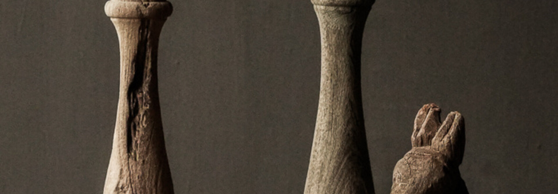 Tough old weathered rustic wooden candlestick