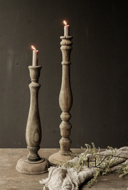 Sturdy old weathered rustic wooden candlestick