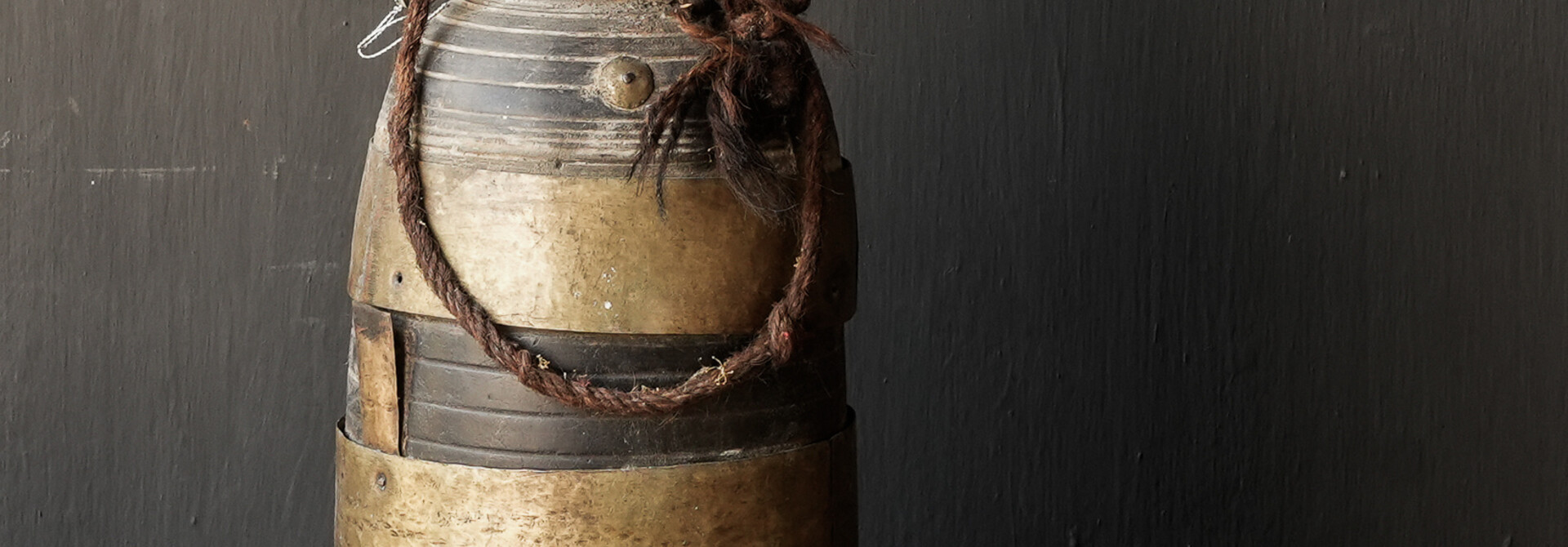 Original old wooden Nepalese jar with lid and copper decoration