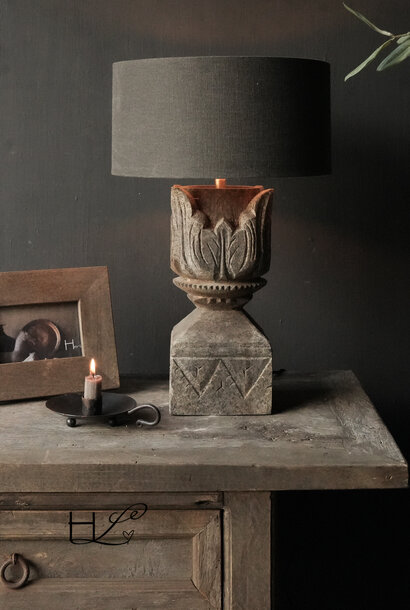 Wooden lamp base made of old wood with carvings