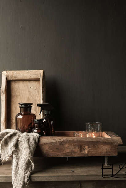 Tray made of old wood on iron legs