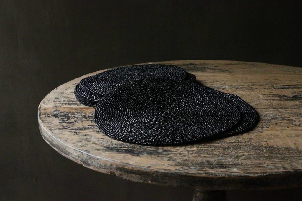 Coaster made of small black beads-1