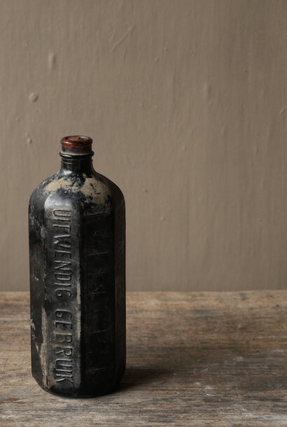 Unieke bodem vondst antieke glazen fles