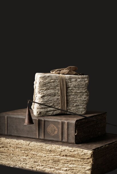 Book with worn leather cover