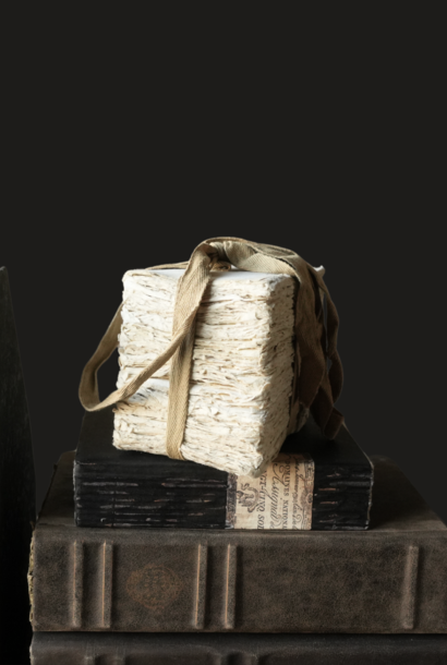 250 vellen scheppapier gebundeld in lint