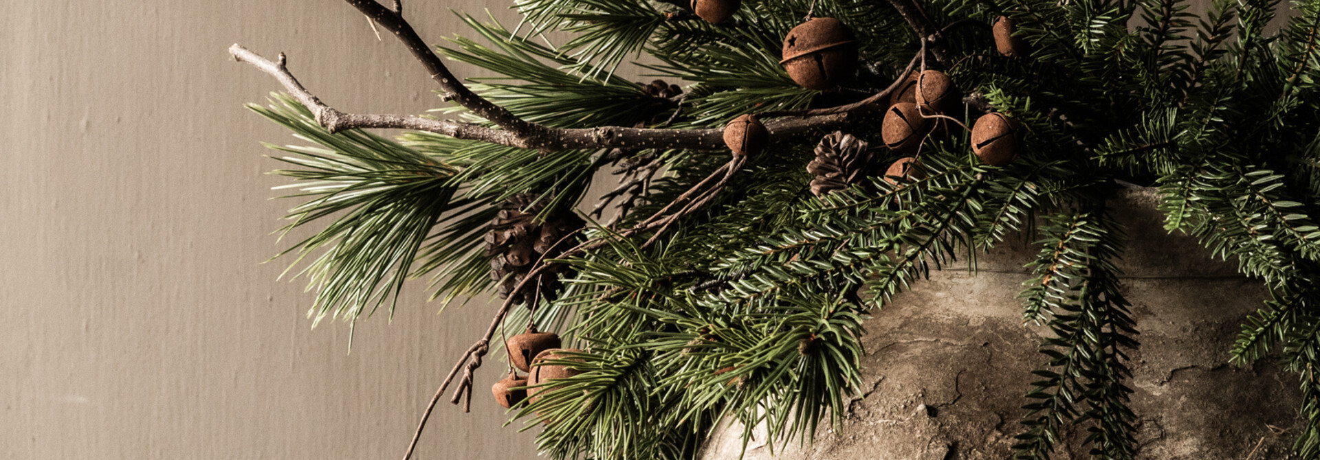 branch with rusty iron bells from