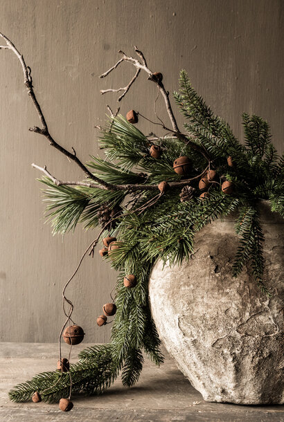 branch with rusty iron bells from