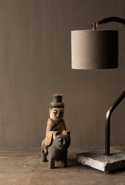 Antique wooden votive statue – figure on animal