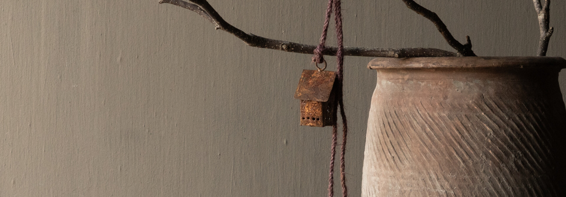 Rope swing with rusty iron birdhouses