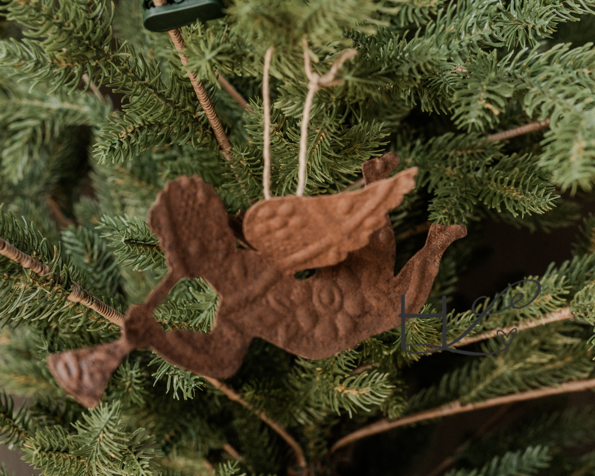 rusty iron hanging trumpet angel-1