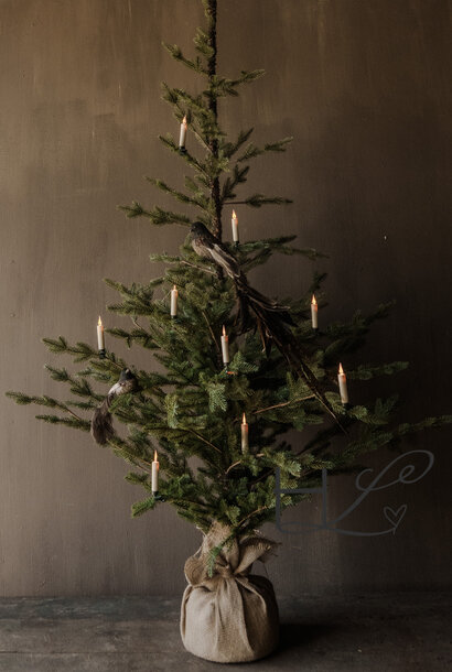 stoere kunst kerstboom met jute voet