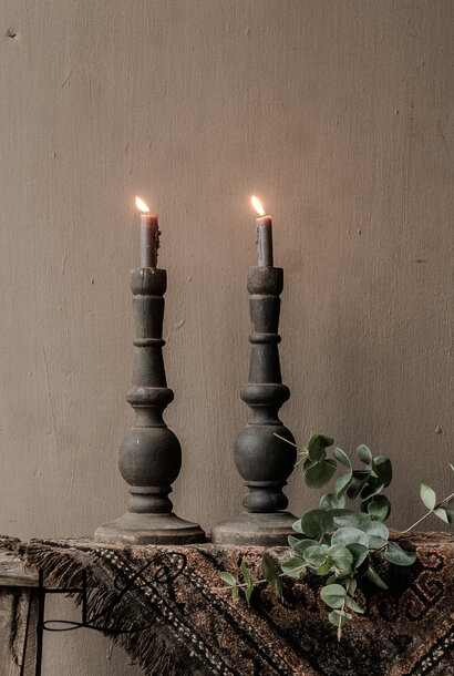 Sturdy old weathered rustic wooden candlestick