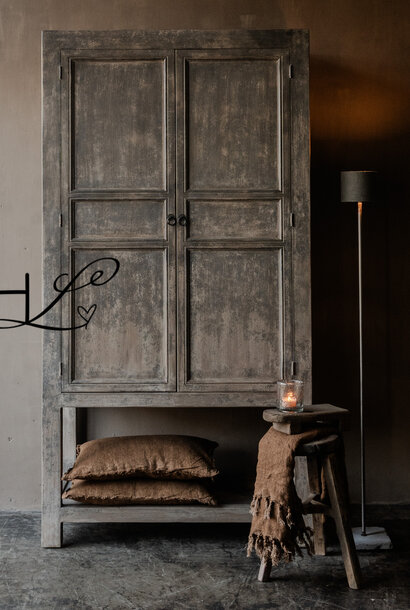 Tall, sturdy, rural, old wooden two-door cabinet on legs – Luksa