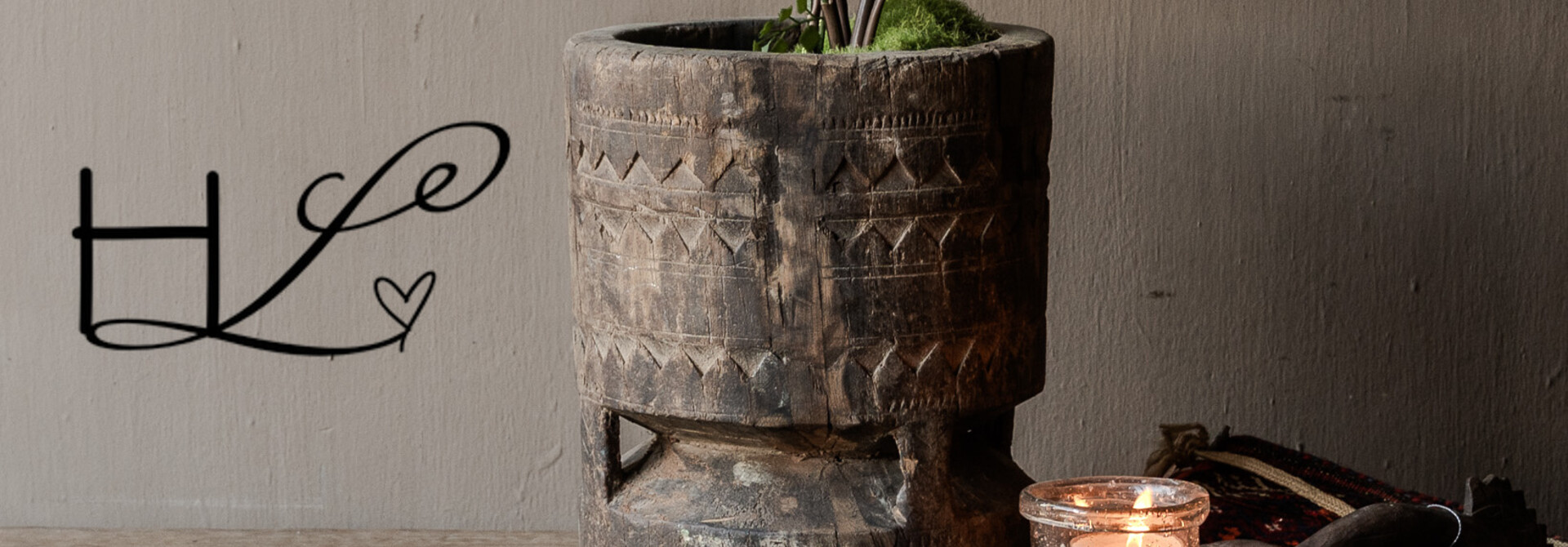 imperfect wooden mortar with hand-carved woodwork