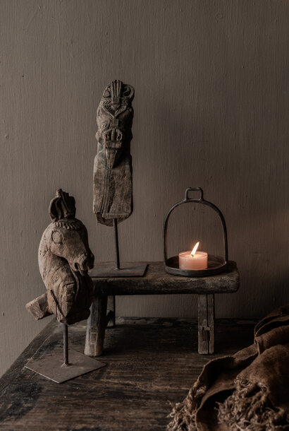 Authentic unique wooden horse on iron stand