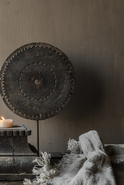 Wooden round wheel ornament on stand – unique old object