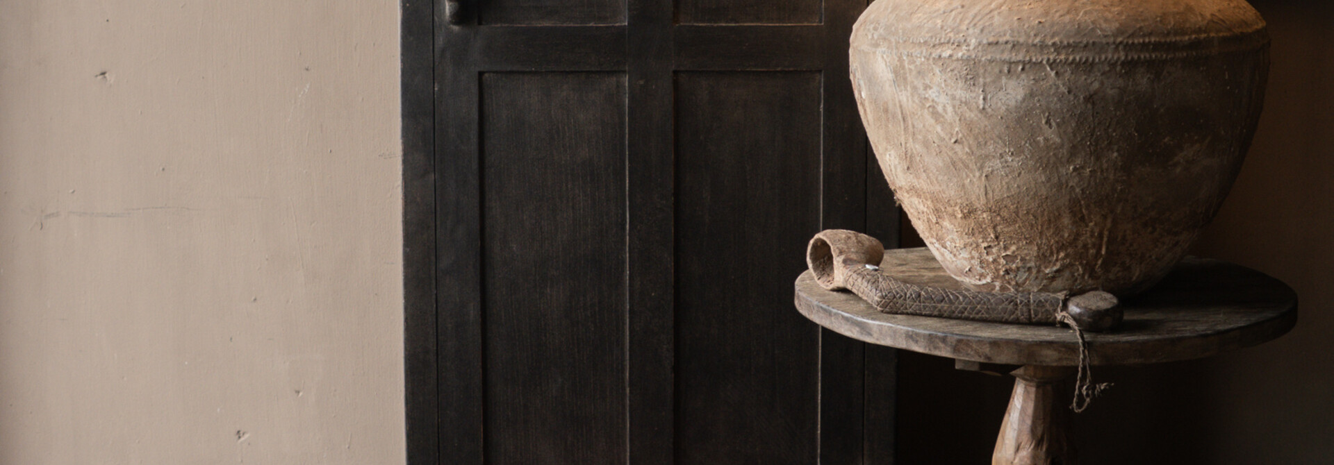 Beautiful, sturdy, rural, old, narrow, single-door wooden cabinet