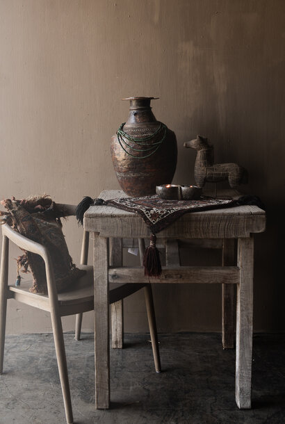 Unique two-person square table with a sturdy, thick top