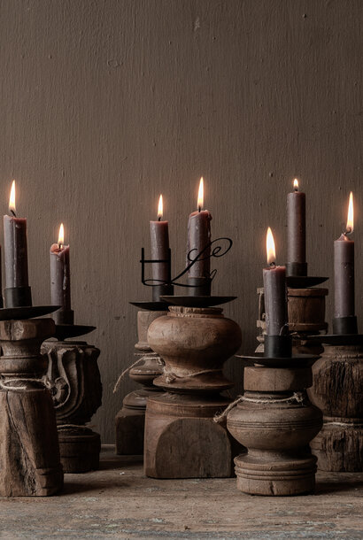 Small wooden candlestick made from old ornament