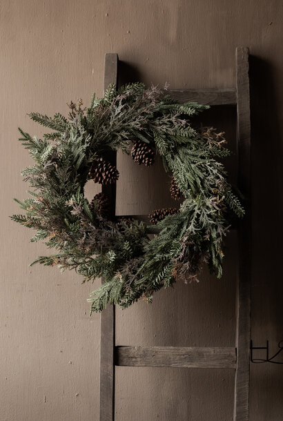 Winter wreath with fir branches & pine cones