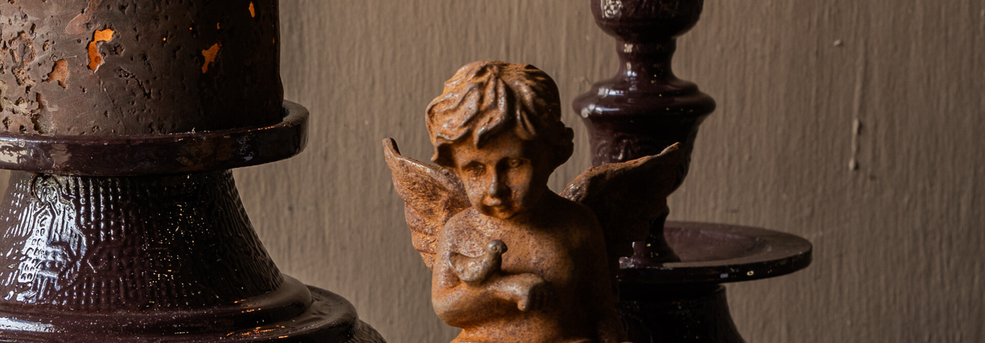 Cast Iron Angel on Sphere – Rust Color