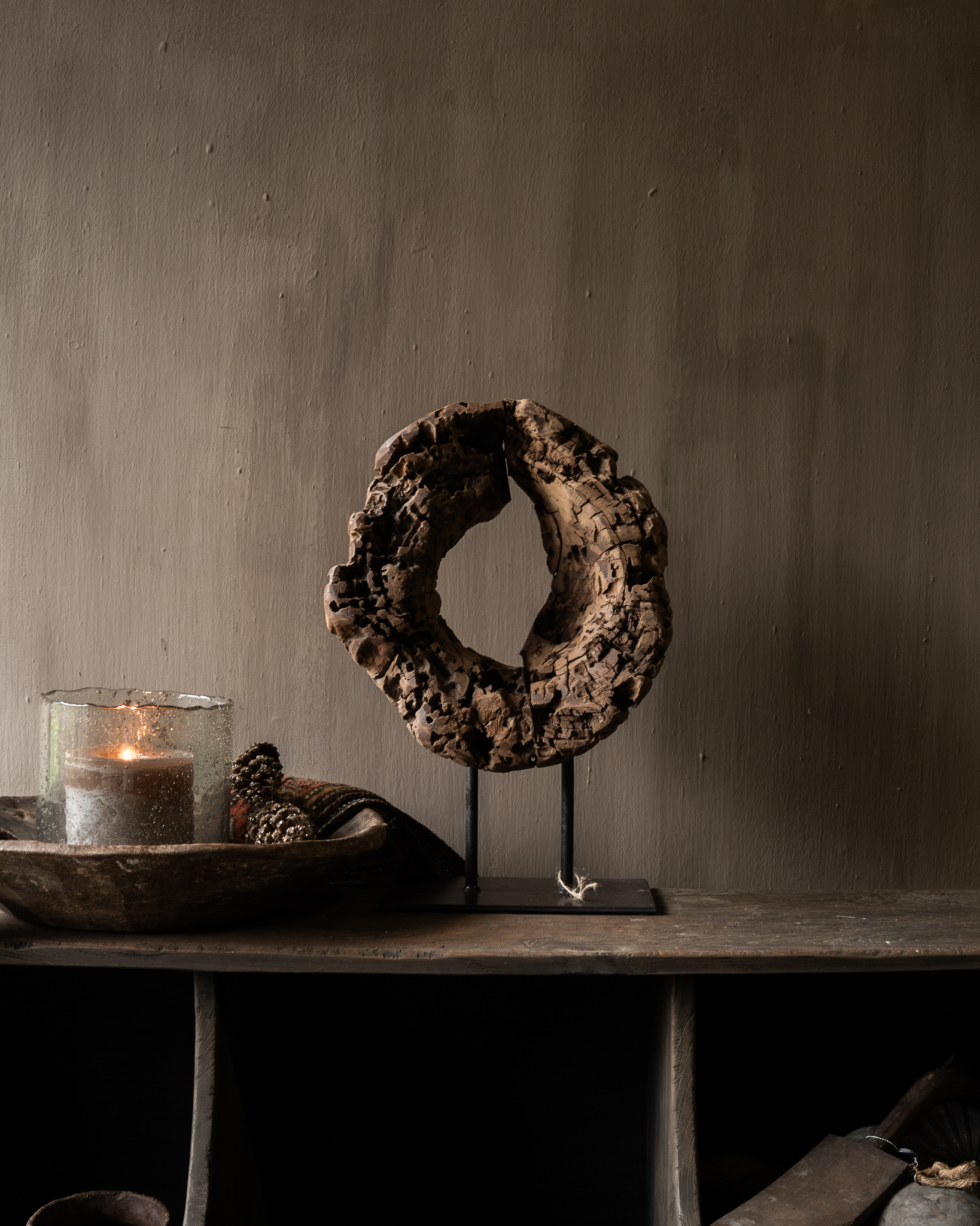 Round wooden ornament made of old wood on a base-6