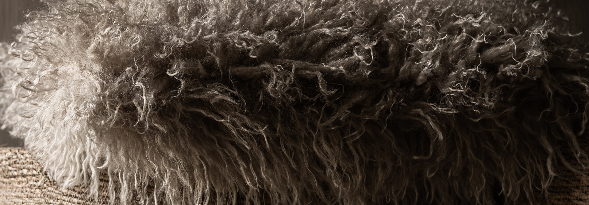 Grey faux fur cushion