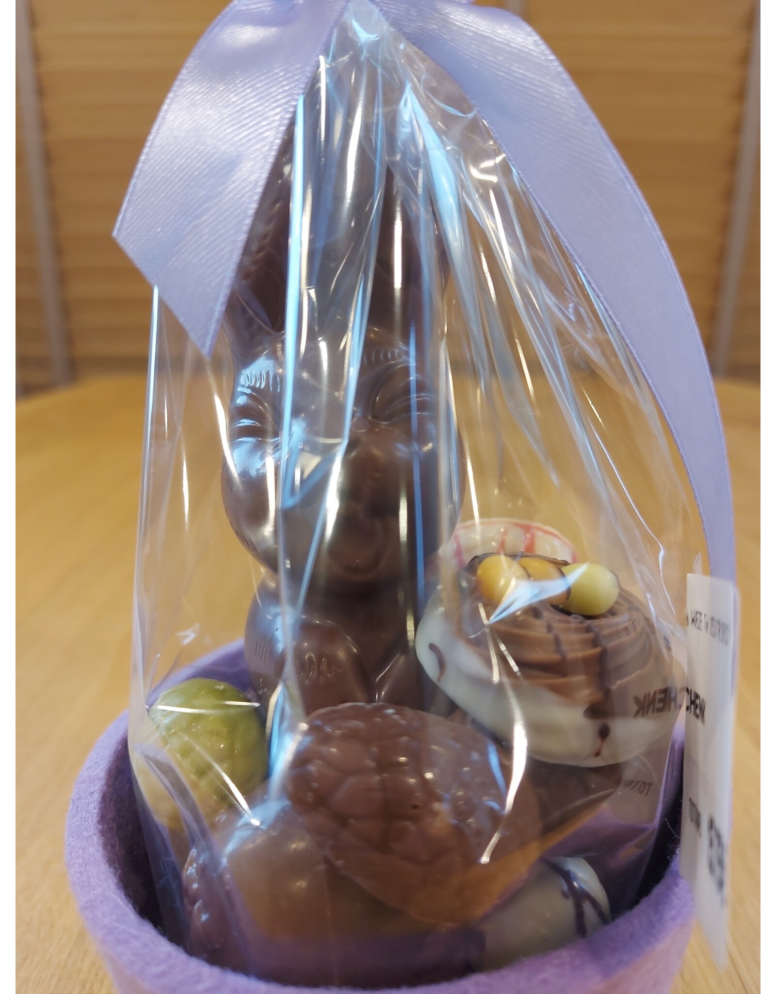 Paasgeschenk - lachhaasje met eitjes en ... in  lila bloempotje