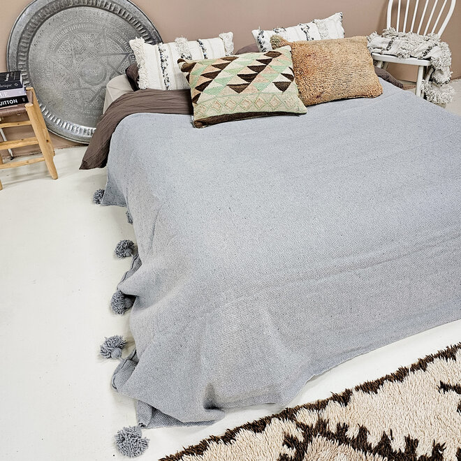 Moroccan blanket diamond pattern grey with pom poms