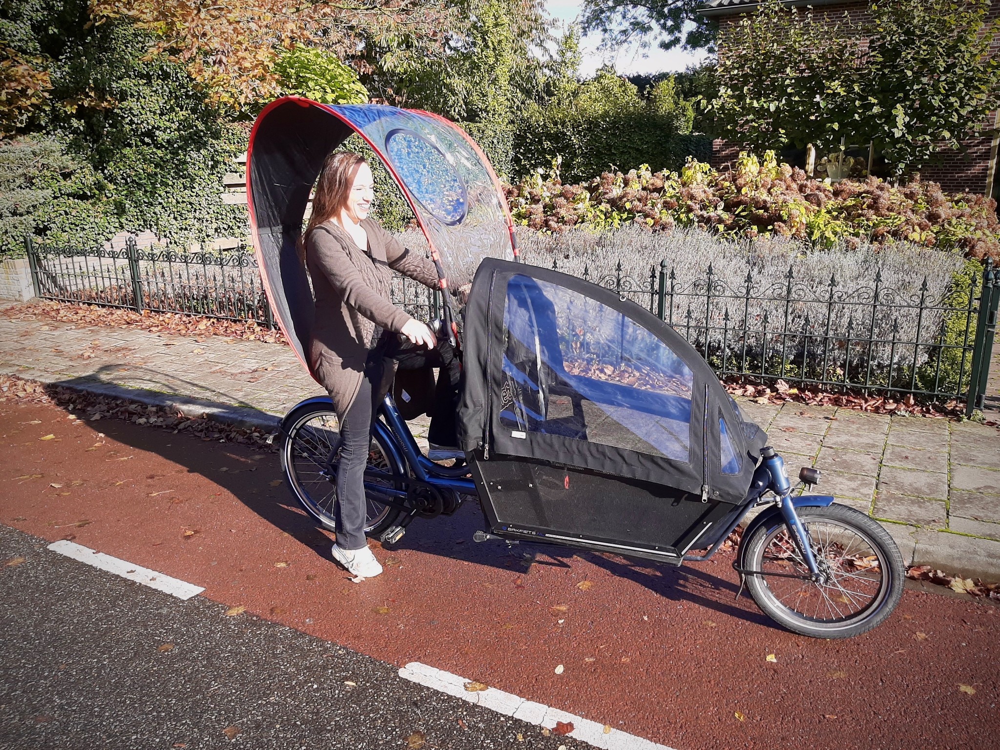 JP9110B; Dryve regentent op bakfiets