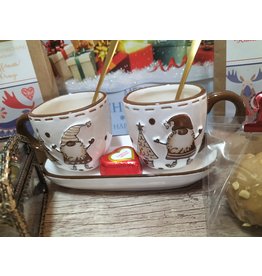 Tea and Herbs Santa Claus koffie kopjes op schoteltje.