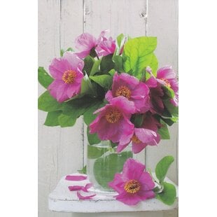 Blanco kaart met roze camelia’s