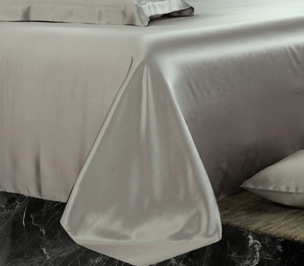 La sábana encimera de seda le ofrece una experiencia de sueño óptima -  Silkmood