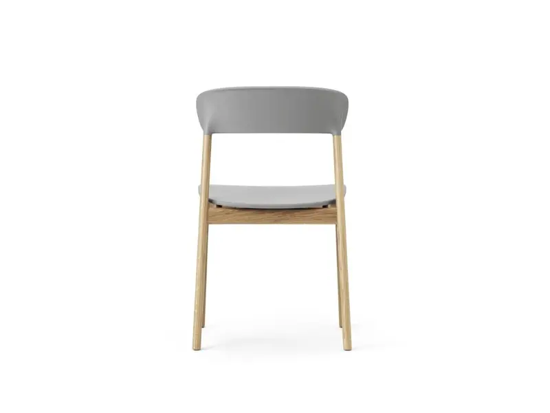 Herit chair met kunststof zitvlak en eikenhouten poten