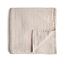 Mushie | swaddle | caramel polka dots