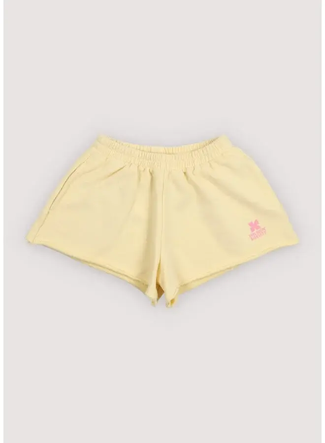 The New Society | tns logo short soft lemon