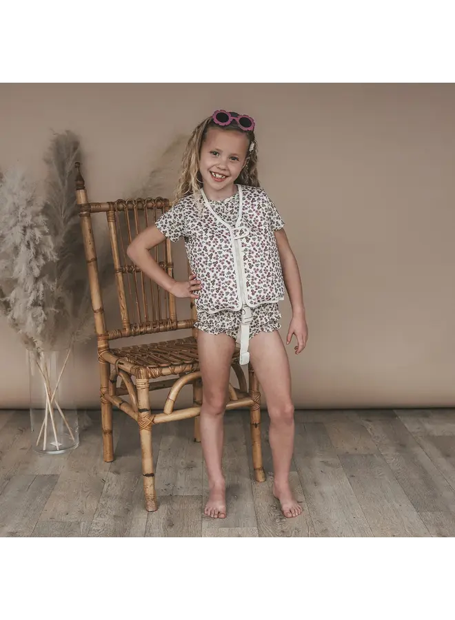 Salted Stories | sparkly flower | floating vest