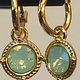 Biba  Oorbellen Biba goud kleur(cristal opal)