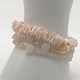 Biba  Armbandjes Biba goud/licht roze creme