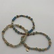 Biba  Armbandjes Biba in goud/blauw/zacht blauw groen