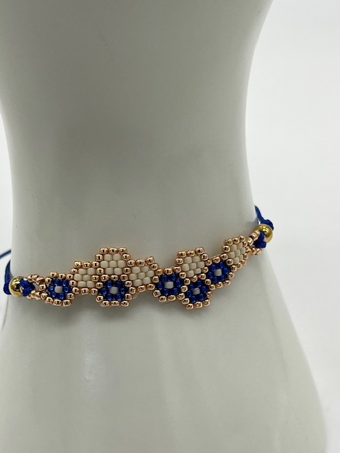 Biba  Armbandje Biba goud/blauw /wit