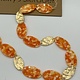 Biba  Ketting Biba goud/oranje /gebr wit