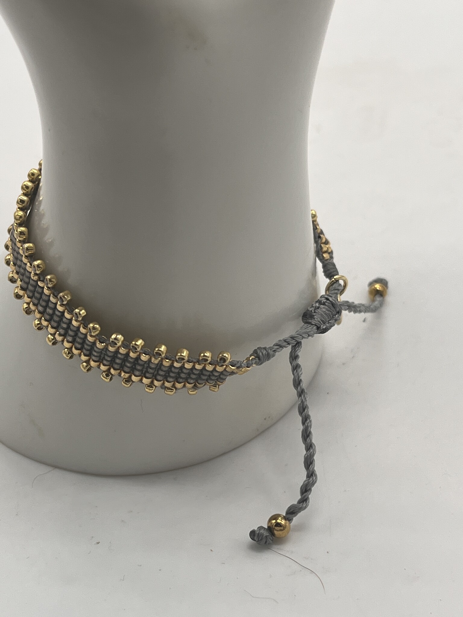 Biba Armbandje Biba goud/grijs