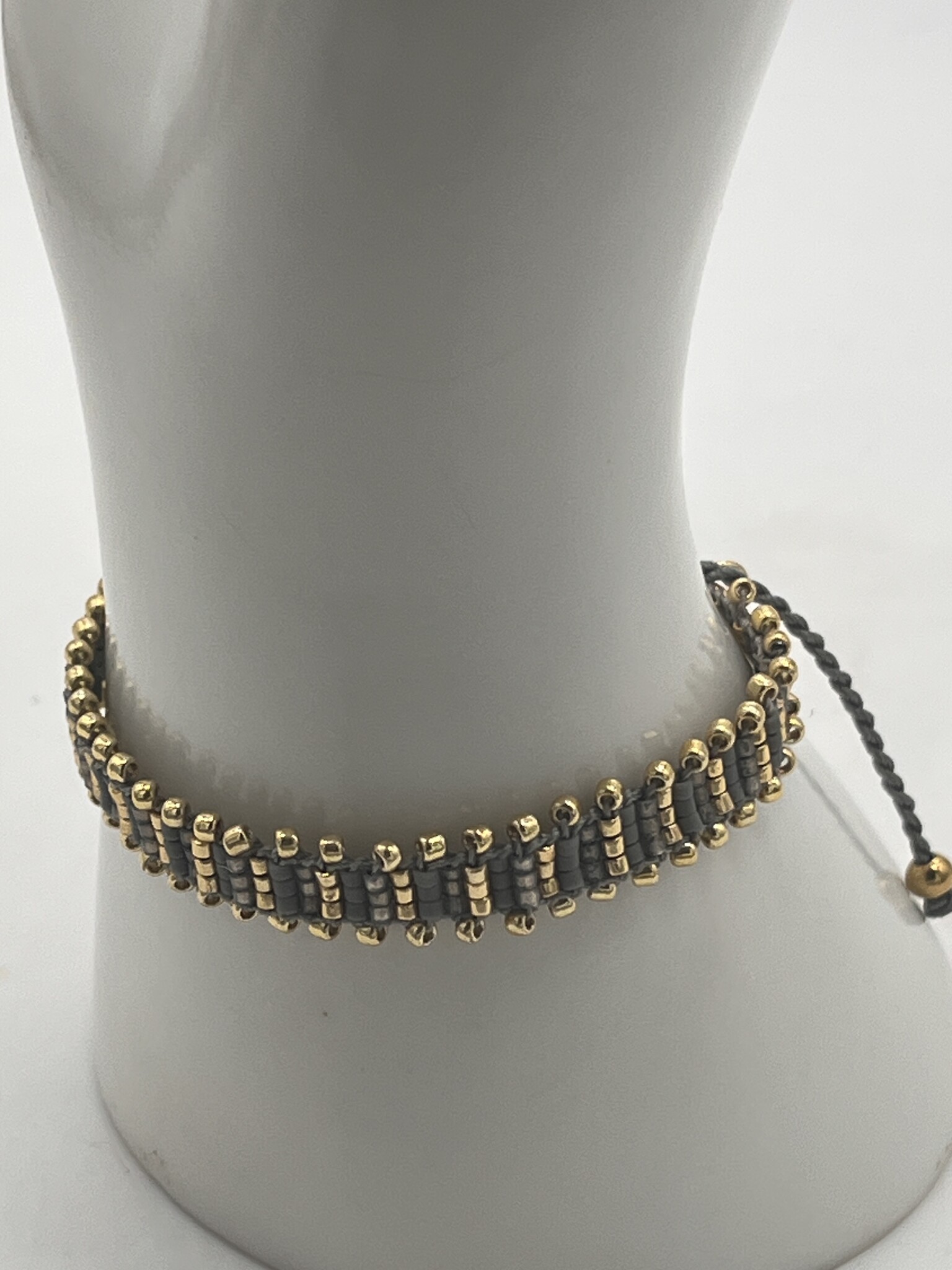 Biba Armbandje Biba goud/grijs