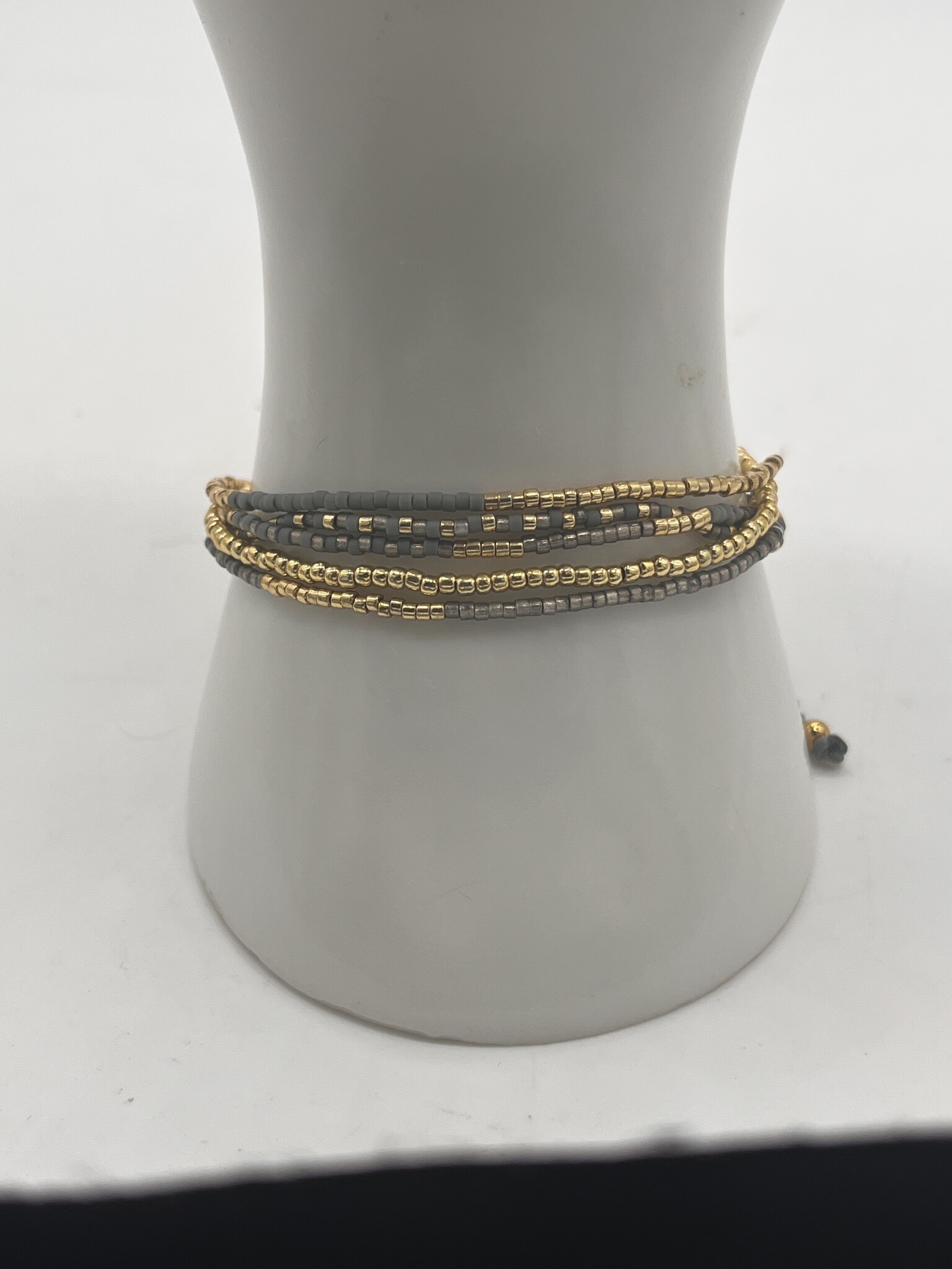 Biba Armbandje Biba goud/grijs