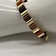 Biba Armbandje Biba goud/bruin