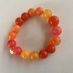 Biba  Armbandje Biba goud mix oranje roze