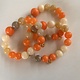 Biba Armbandje Biba goud/oranje grijs taupe wit